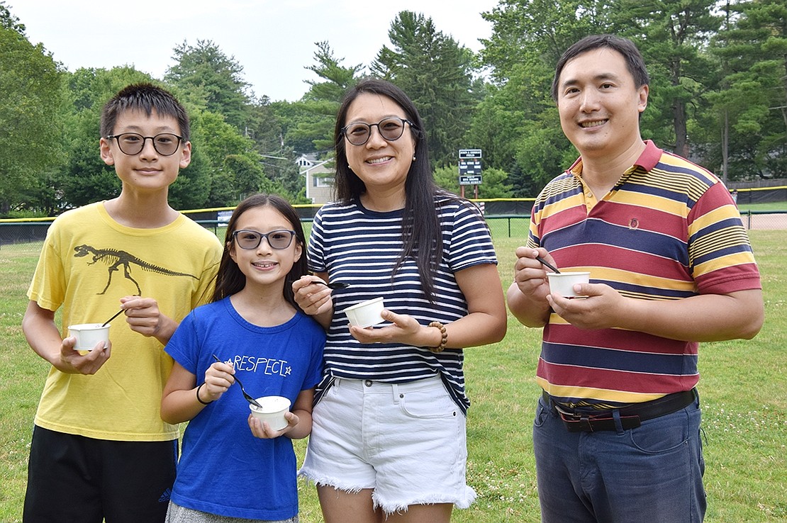 Wilton Road residents rising Blind Brook Middle School eighth-grader Ryan (left), rising sixth-grader Jamie, and their parents Ying and Weili Chen enjoy a family outing to Pine Ridge Park.