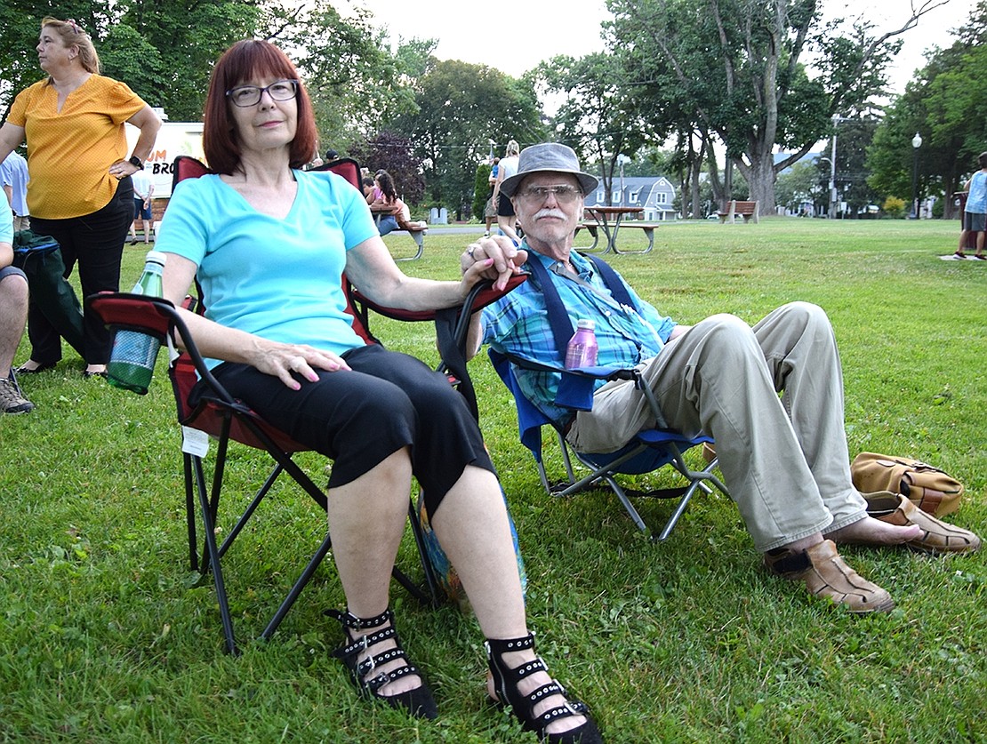 Shelley Avenue residents Jeanette and Randy Briggs enjoy a night out at the first show in Port Chester’s Concerts in the Park series.