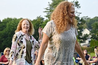 Coco McSweeny (left), of Ossining, and Whittemore Place resident Robin Chipkin dance at the Andrea and the Armenian Rug Riders concert on Wednesday, July 19 at Pine Ridge Park. The show was part of the Village of Rye Brook’s Music in the Park series, which will bring free concerts to the community throughout the summer.