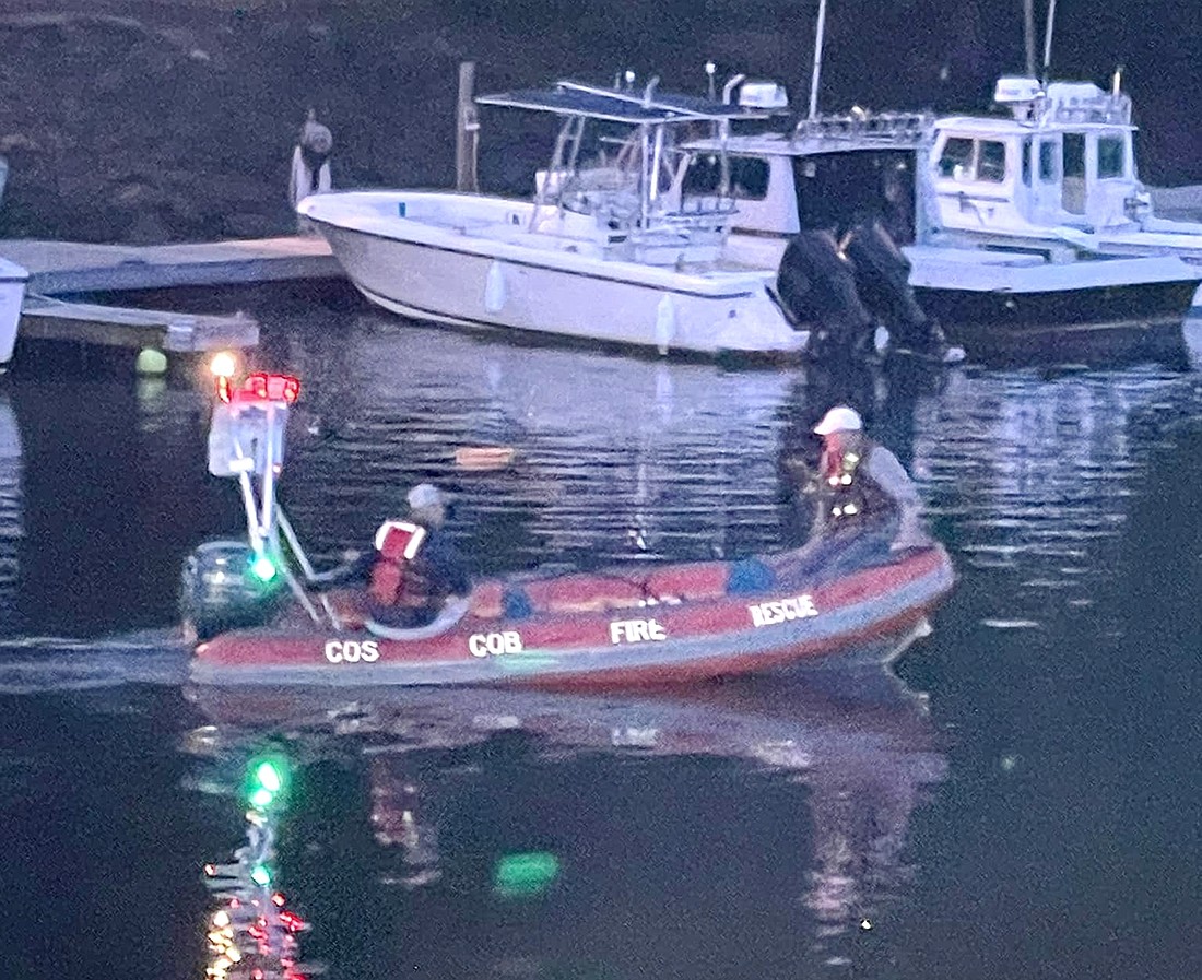 A boat from Cos Cob Fire Rescue searches for the sunken car driven by Juan Garcia-Suchite in the Byram River. Garcia-Suchite, a Port Chester resident, reportedly died after hitting a boulder and launched his vehicle into the river on Thursday, Aug. 3.