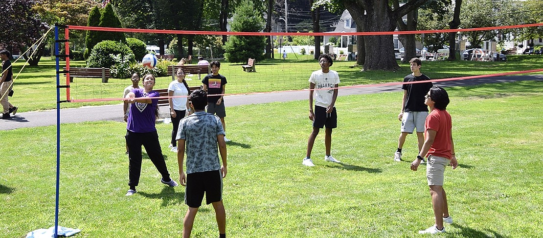 Attendees of the Youth Summit face off against one another in a volleyball tournament.