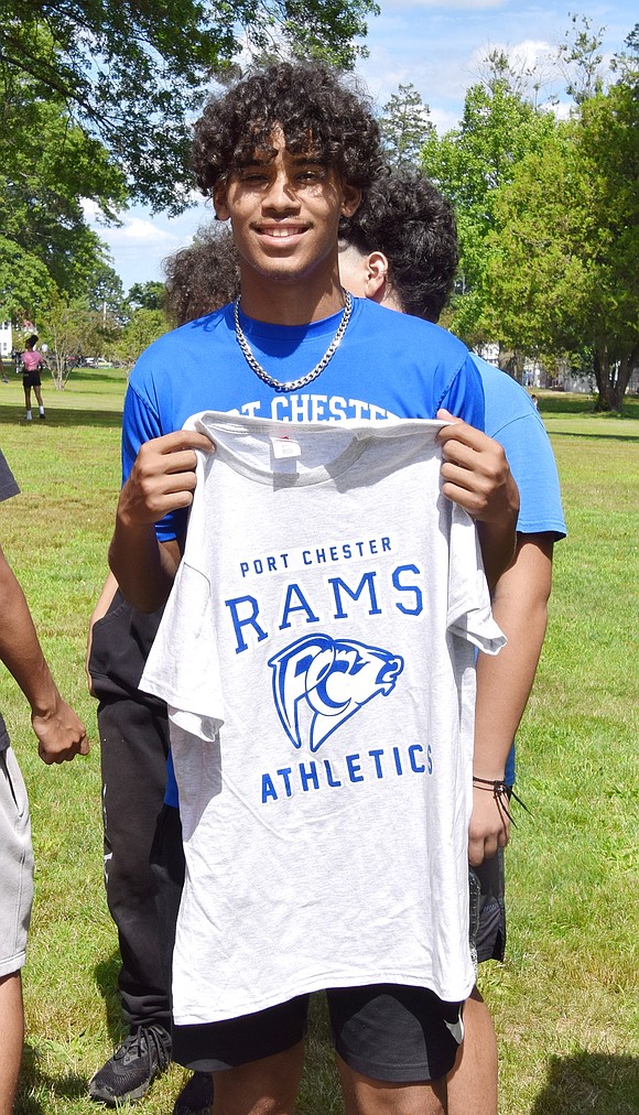 Port Chester High School sophomore Alexis Morel takes a moment to show off his school spirit.