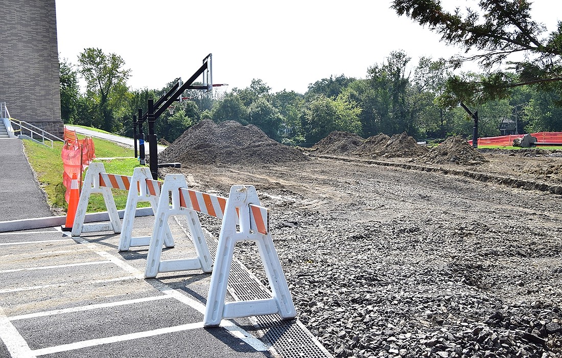 The blacktop behind Ridge Street Elementary School is torn up on Wednesday, Aug. 9, as the district works to finish the fire truck access road to adequate standards. It’s the final project the Blind Brook School District must complete before it can apply for a permanent Certificate of Occupancy.