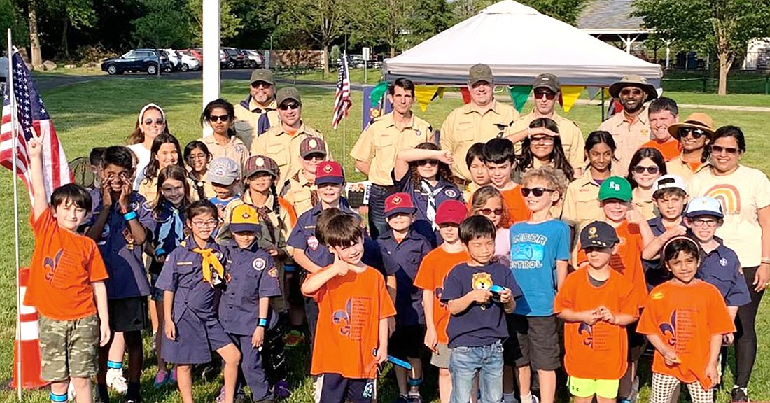 Rye Brook Cub Scouts, parents and leaders gather for a group picture at Pack 3’s annual overnight campout at Crawford Park on June 10.