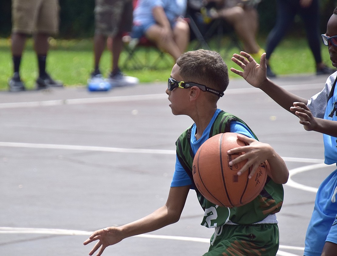 Nine-year-old Devin Velez, of Pleasantville, gets ready to take a shot.