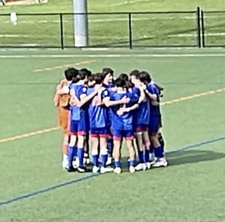 Blind Brook boys’ varsity soccer starting lineup huddles before kickoff of a scrimmage at Horace Greeley High School on Tuesday, Aug. 29.