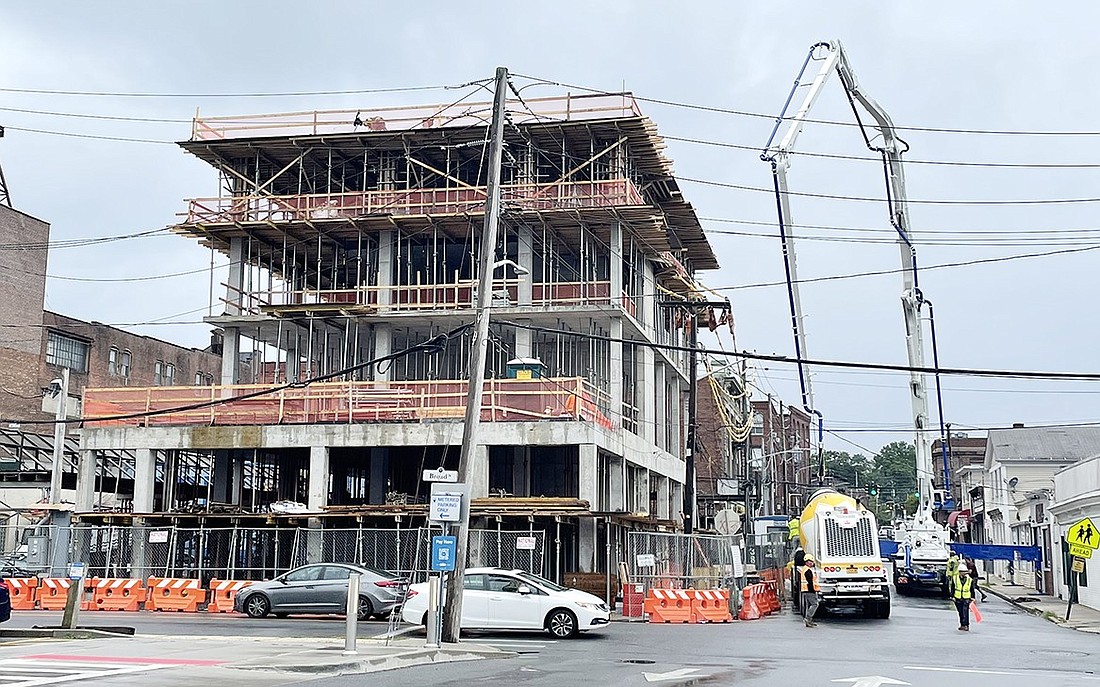 Construction proceeds on the eventual 9-story mixed-use building at 30 Broad St. which will house a brewpub on the first floor. Irving Avenue is blocked off on Aug. 24 while concrete is poured between floors. The structure is now up to seven floors.