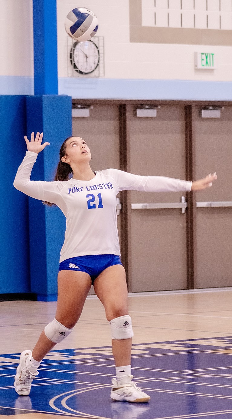 Port Chester middle hitter Nataly Suertegaray, a junior, serves the ball during the Lady Rams’ volleyball game against Roy C. Ketcham High School at home on Wednesday, Sept. 6. The Lady Rams defeated the Indians 3-0.