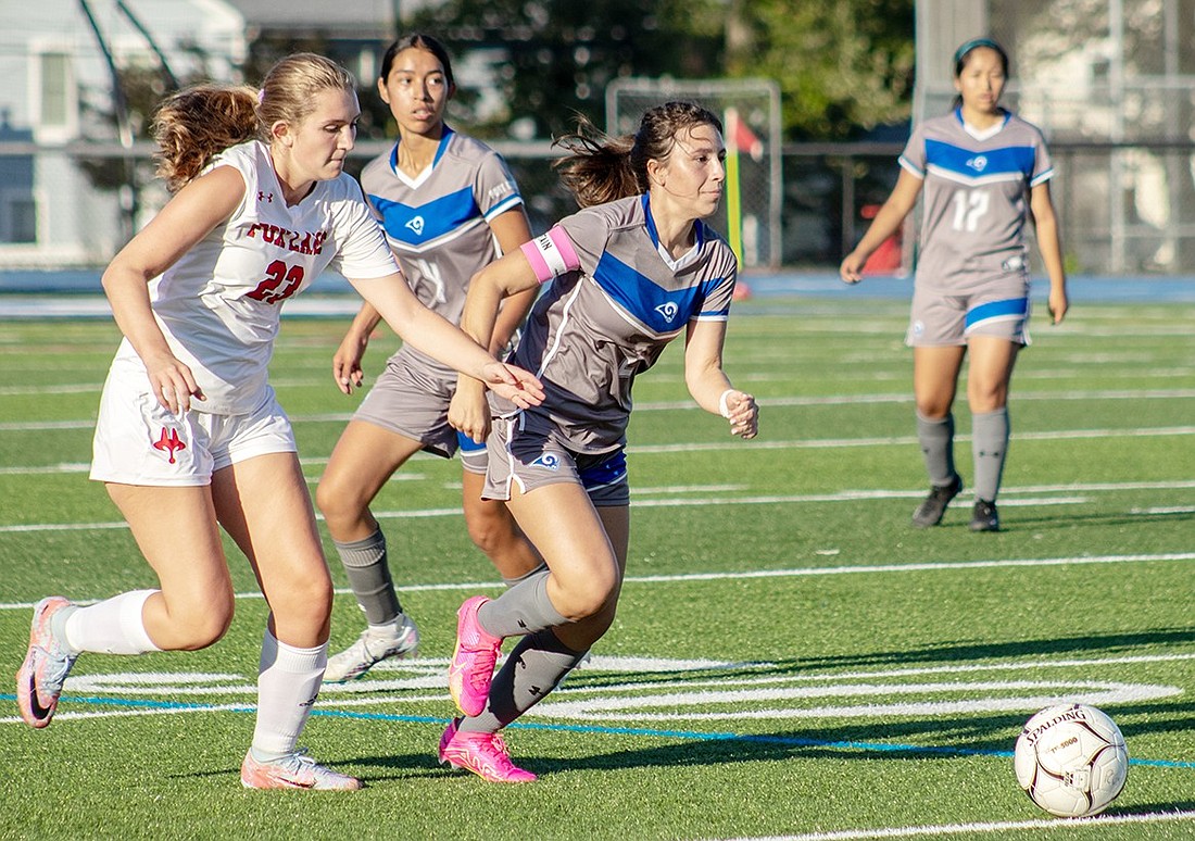 Port Chester defenseman Samantha Munoz attempts to break away from a Fox Lane player during the Lady Rams’ home soccer game against Fox Lane on Wednesday, Sept. 20. The Foxes defeated the Rams 3-0.