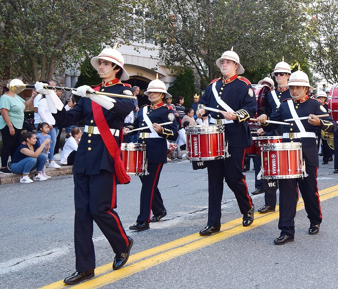 Pride of Port Chester Parade Drum Major Thomas d’Esperies, a high school senior, leads his fellow musicians down Westchester Avenue.