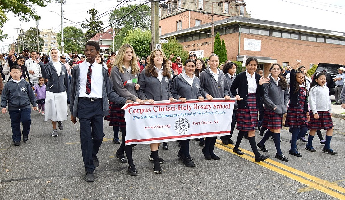 With a large crowd marching the entire route, Corpus Christi-Holy Rosary School was well represented in the procession.