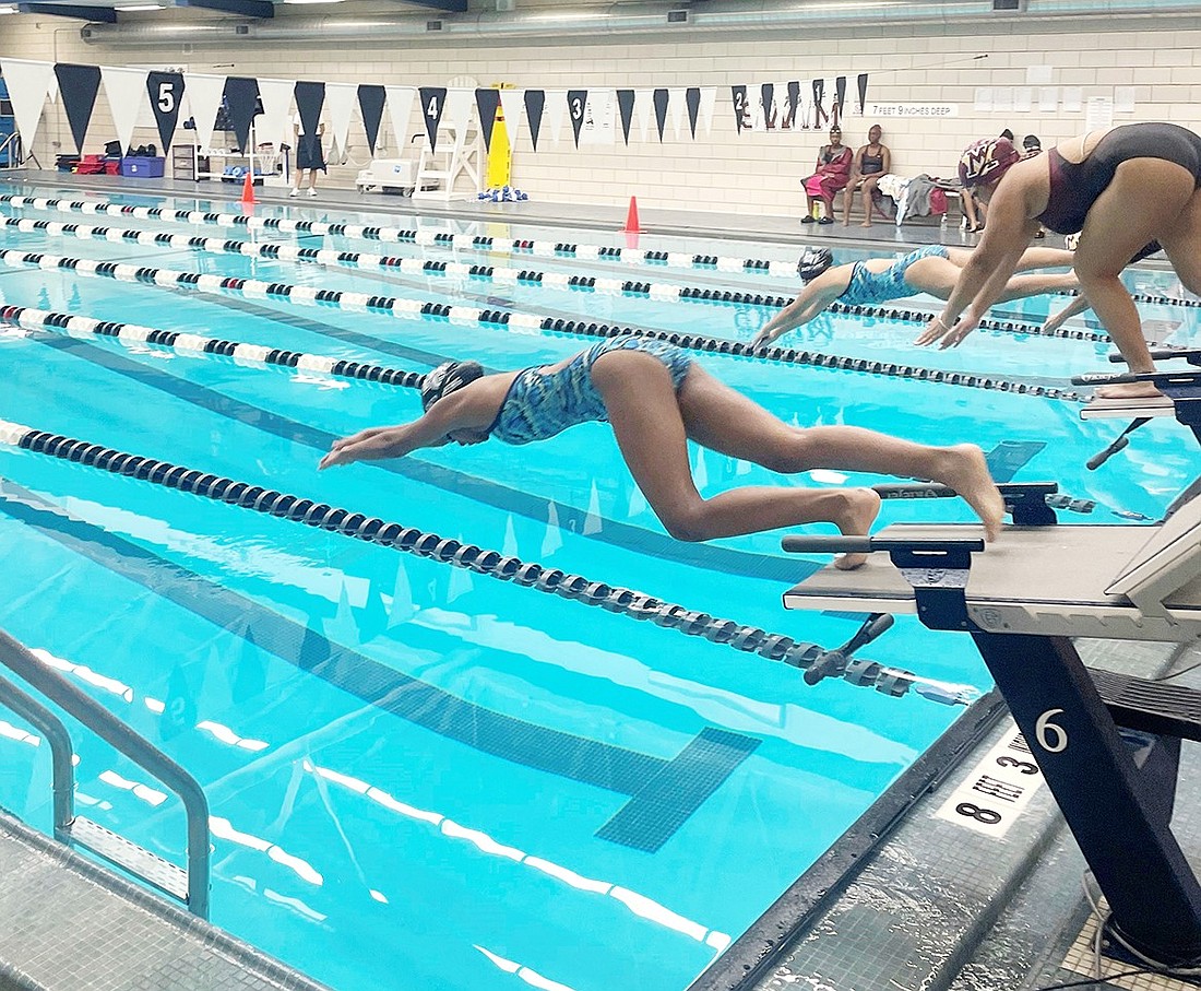 Port Chester freshmen Monika Tovar (front) and Estefana Bautista start the 50-freestyle against Mt. Vernon on Wednesday, Oct. 4. Bautista won the event and the Lady Rams triumphed over Mt. Vernon to take the meet 77-63.