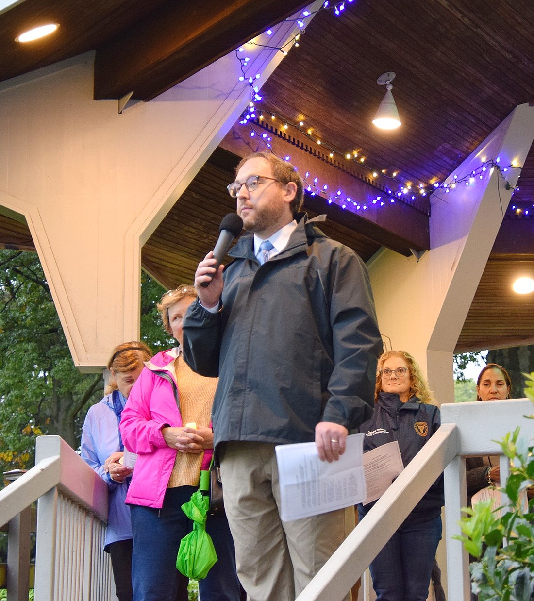 During a community vigil to show support for the local Jewish community after the breakout of the Israel-Hamas war, Congregation KTI Rabbi Ben Goldberg speaks to the crowd from under the gazebo at Lyon Park on Saturday, Oct. 14.