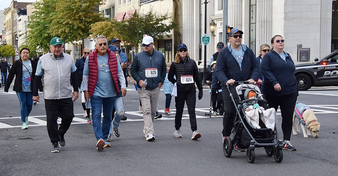 Port Chester’s North Main Street was the backdrop for the race, which featured runners, joggers and walkers of all ages, only some competing in the 5K. There were 441 participants, 120 of those from Port Chester.