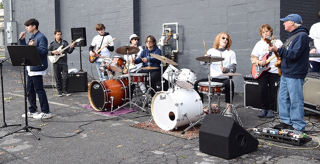 The French-American School rock band includes musicians of all ages.