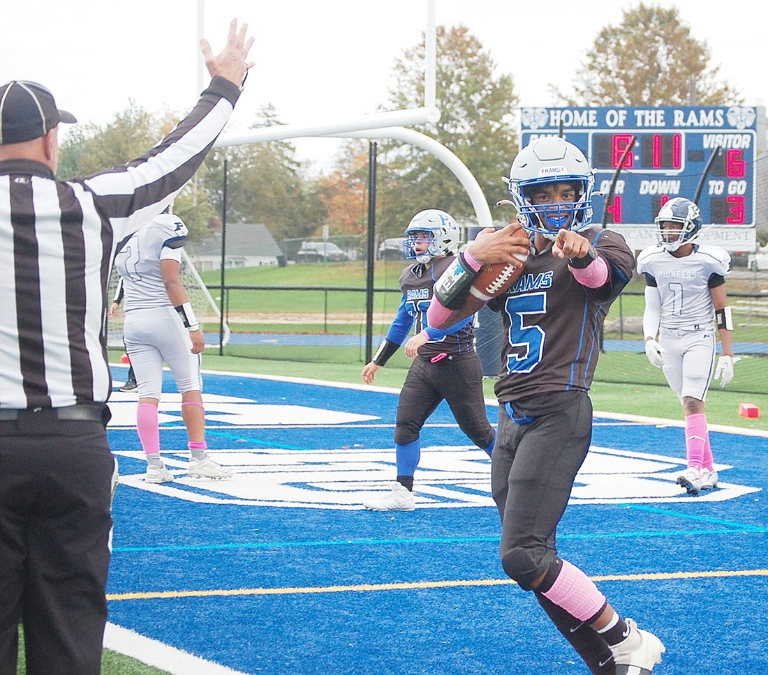 Port Chester’s Jayden Arbusto is all smiles after making a key interception in last Saturday’s homecoming game against Poughkeepsie. The Rams beat the Pioneers 23-6.