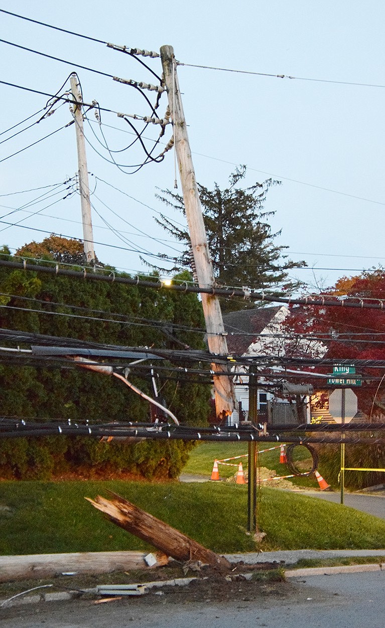 A commercial vehicle from GFX Site Development struck this utility pole at the corner of King Street and Tower Hill Drive around 5 p.m. Thursday, Oct. 26 and snapped it in half, pulling down a mass of wires and cables servicing many residences in the area which provided them with electricity, cable television, telephone and internet. A portion of King Street was blocked off for hours while the accident was cleared and utility trucks worked to repair the damage.