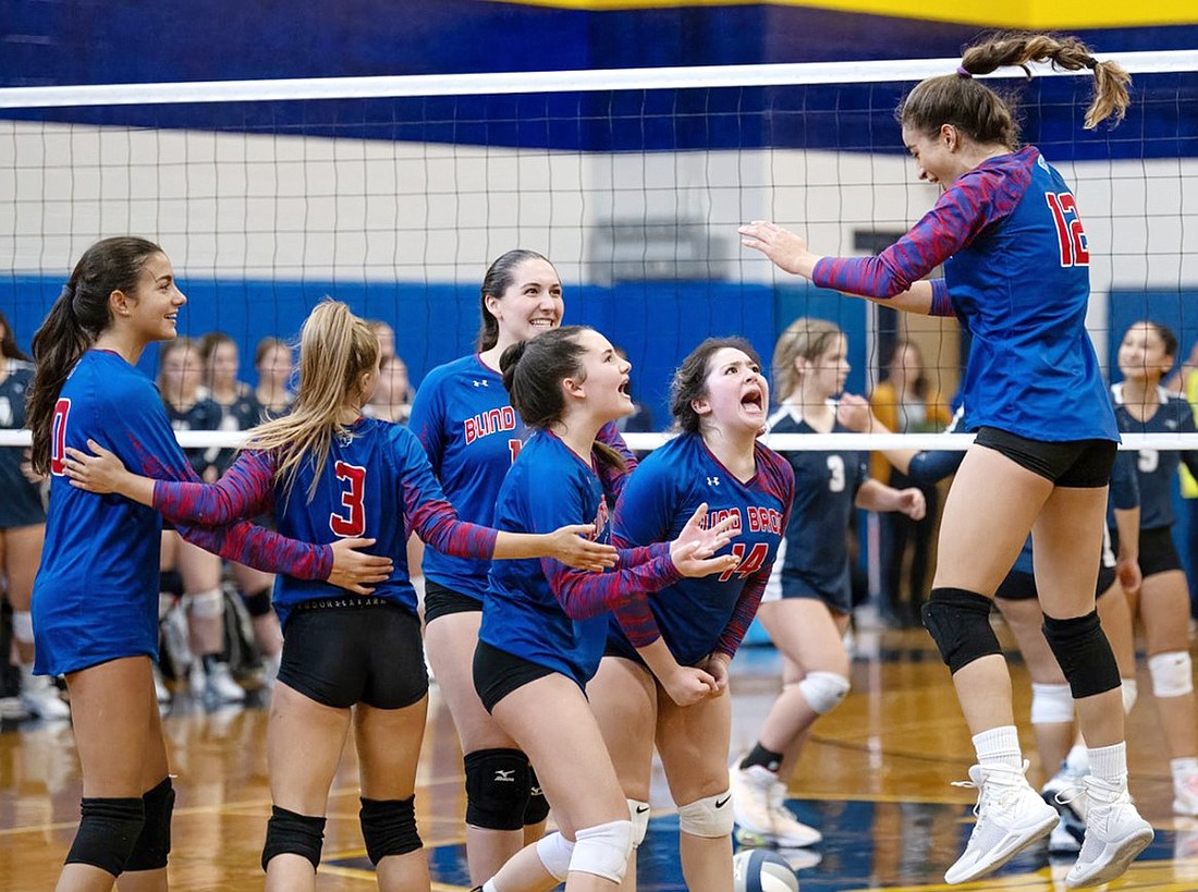 The Blind Brook High School volleyball team jumps for joy after winning a point off a kill from Oriah Rosenfeld in the sectional final game against Putnam Valley on Saturday, Nov. 4 at Mahopac High School. They would go on to lose the contest 1-3.