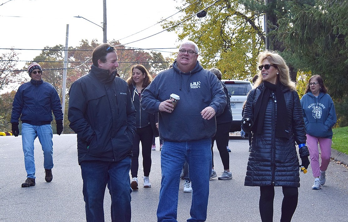 Rye Brook Mayor Jason Klein (left), Village Administrator Chris Bradbury, and Trustee Susan Epstein lead the community through a 5-kilometer route.
