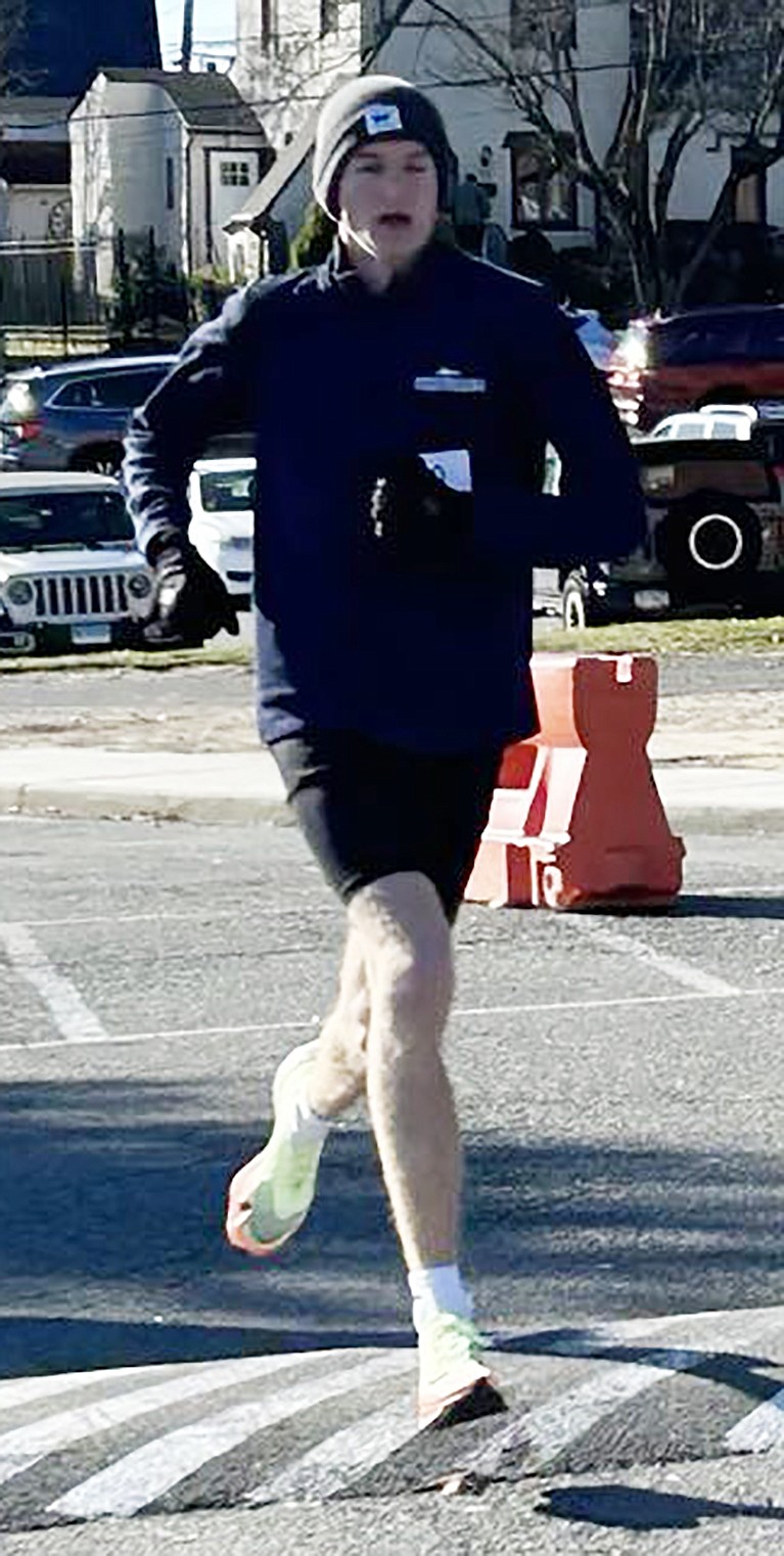 Kornel Smith From Briarcliff Manor heads toward the finish line as the first male finisher of the Turkey Trot on Thanksgiving morning, which started and ended at the flagpole at Port Chester High School.