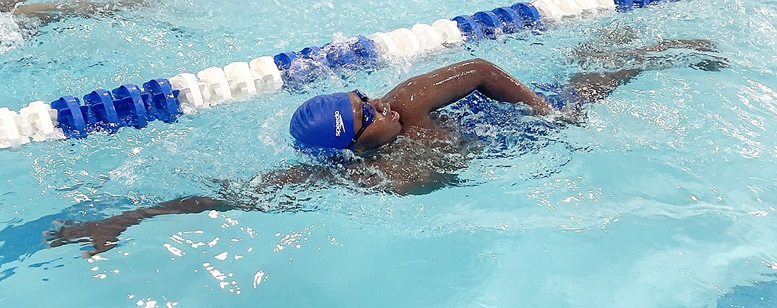 Freshman Brandon Moody, here swimming freestyle, is part of the trio of young swimmers who were the high scorers in an away loss to Yonkers last Friday, Dec. 8.