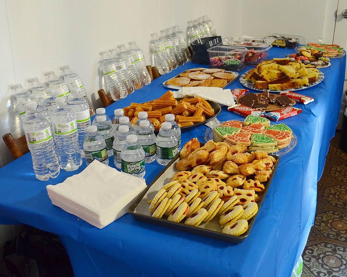 A spread of goodies from around the world fills a table in the kitchen to tempt visitors entering the Bush-Lyon Homestead for Winterfest.