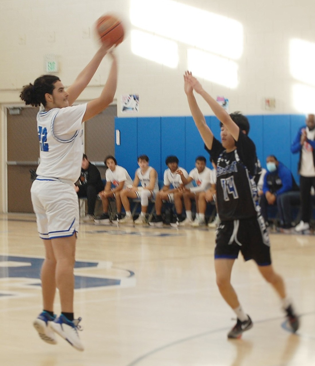 Sophomore Walquidi Valerio attempts to sink a basket in the consolation game of the Louis Larizza Jr. Memorial Basketball Tournament against Edgemont Saturday, Dec. 9 at King Street School.