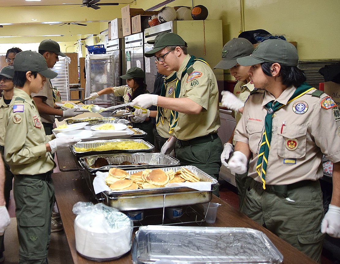 Members Port Chester BSA Troop 400, Girl Troop 420 and Troop 35 of Greenwich, Conn., were constantly on their feet, prepping and serving food for attendees as volunteers.