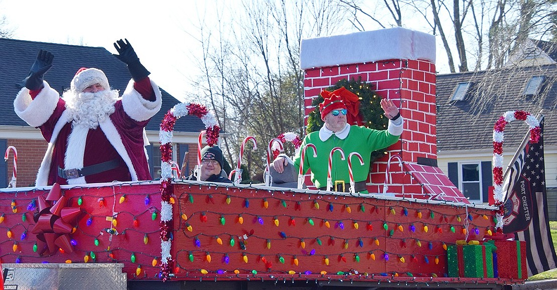 Reprising his role of Santa, Richard Longo is joined by 2nd Assistant Chief Engineer Nicholas Melillo and the firefighting elf Edward Garrity as they make their way down Betsy Brown Road. The Santa Run started on Hawthorne Avenue and weaved through both Port Chester and Rye Brook.