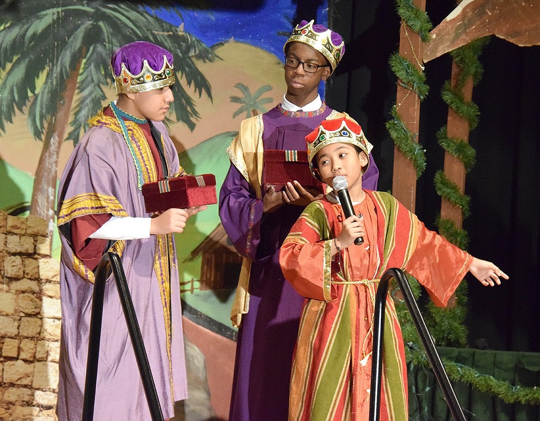 King Melchior (left), King Kaspar and King Balthazar (played by Joshua Romero, John Turner and Jaiden Maxime) explain that they’re not visiting to stay at the inn, but because they’re following the star leading them to a newborn king.