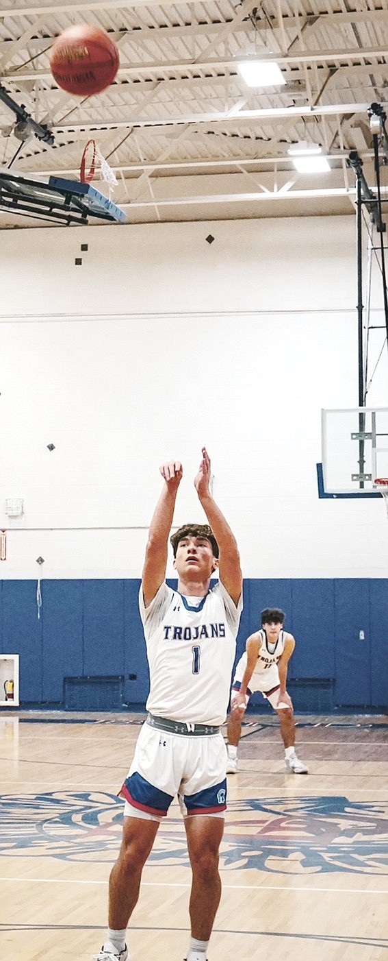 Sophomore captain Noah Brookman takes a free throw against The Leffell School in Blind Brook’s home opener on Wednesday, Dec. 13. Brookman led the Trojans with 19 points in the 62-57 victory.