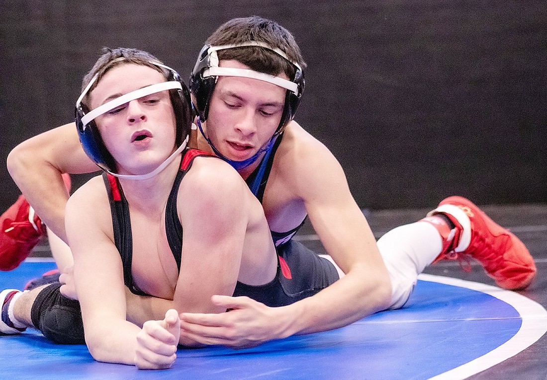 Port Chester junior Eduar Polanco (on top) won his match against Ronan Sutter of Rye 10-2 in the Carlucci/Miller Wrestling Tournament hosted by Port Chester High School on Saturday, Dec. 16. He was named the Rams’ most outstanding wrestler after going 5-1 on the day.