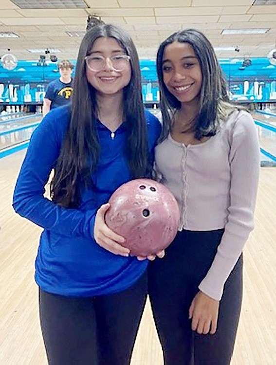 Emily Garcia (left) led the way with a 120 average in the Lady Rams’ Dec. 11 match against Scarsdale while Skylar Sams averaged 95.