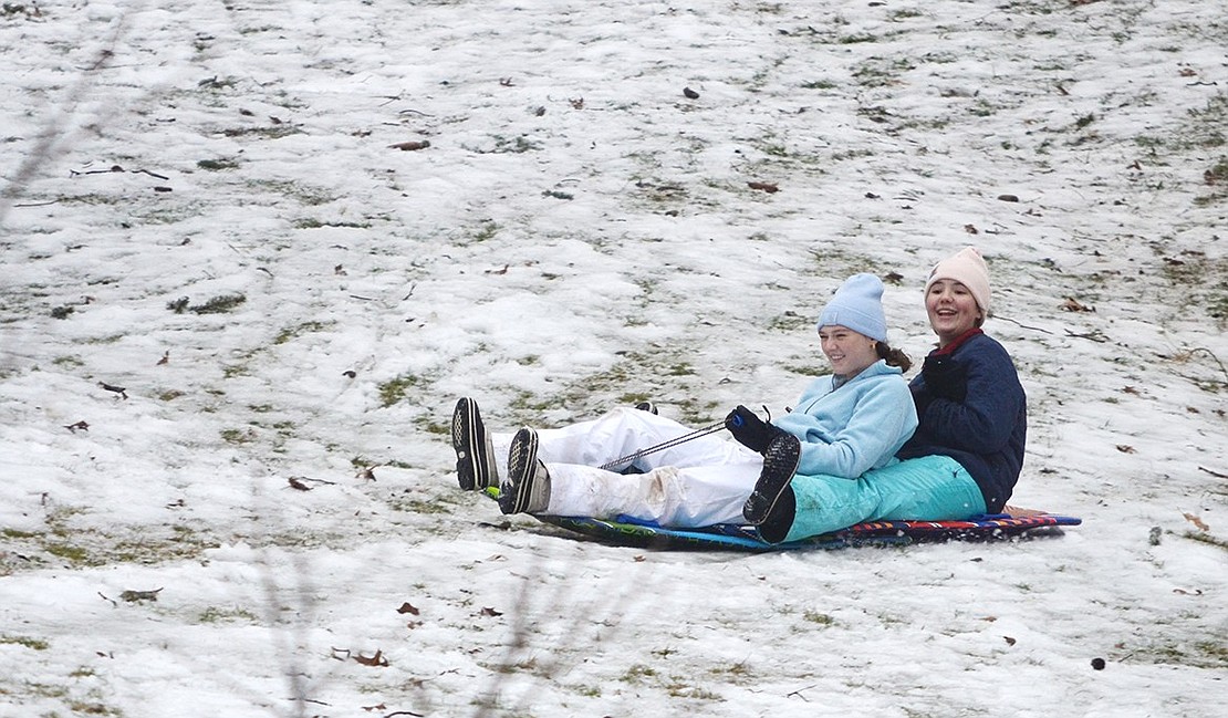 Friends Ashley Muccia, 13, of Rye (left) and Bixie Dolce, 14, of Hawthorne Avenue, Rye Brook, had difficulty staying on course on the Crawford Park hill, ending up running into one side of the course or the other and landing in the brush on one run. It was all in the name of fun.