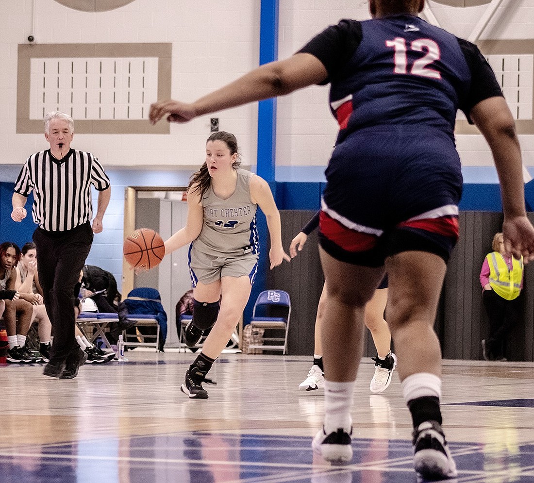 Port Chester guard McKayla McLoughlin (12), an eighth grader, dribbles the ball down the court during the Lady Rams’ home game vs. Roosevelt High School on Monday, Jan. 22. The Lady Rams defeated the Sharks 47-31.