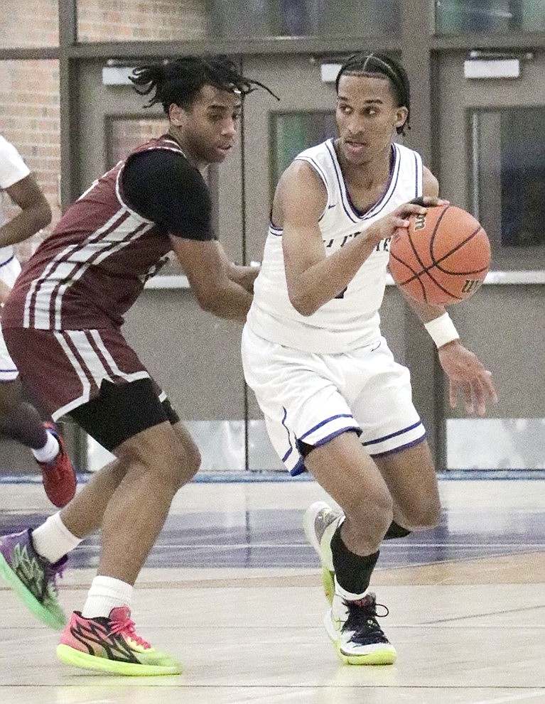 Senior Guillermo “Memo” Zabala intercepts the ball from an Ossining player and proceeds to score for the Rams in last Friday’s (1/19) home loss to the Pride. Zabala is 70 points short of a 1,000-point career mark.