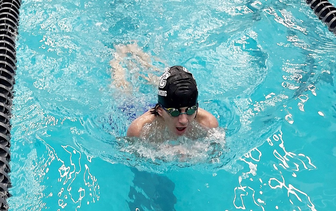 Port Chester’s Tiernan McLoughlin scores points swimming the 100-breaststroke against Rye/Rye Neck/Blind Brook on Tuesday, Jan. 23 at the Hommocks Pool in Larchmont.