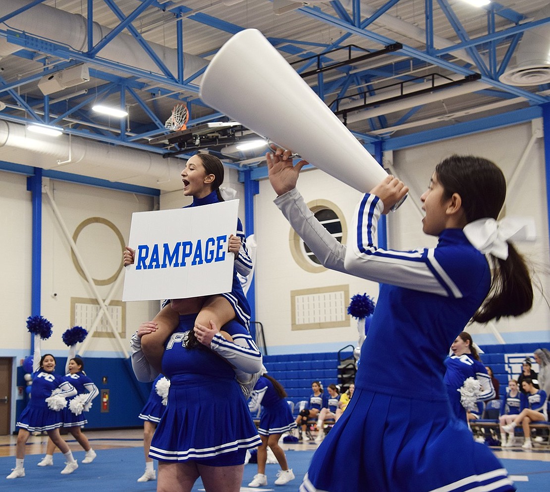 Alexis Patafio, a seventh-grader, calls for a “rampage.” Fellow seventh-grader Ariana Casarella does the same with a megaphone. The two are members of the Modified Blue Team, the competitive branch of the Port Chester Middle School cheer program.