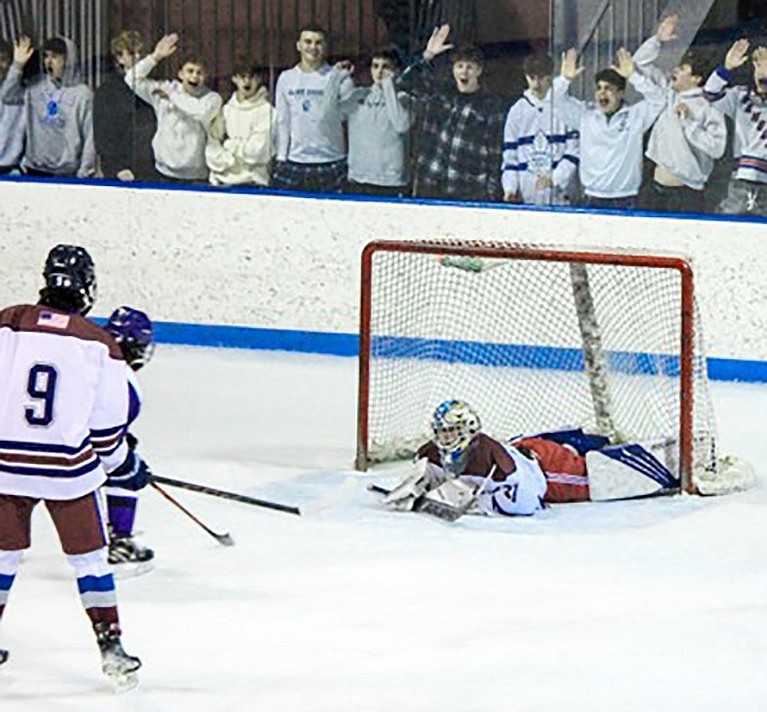 Fans cheer on Rye Town-Harrison Titans goalie CJ Stumpf (Blind Brook junior) for a save against New Rochelle on Tuesday, Jan. 30 at Playland Ice Casino in Rye.