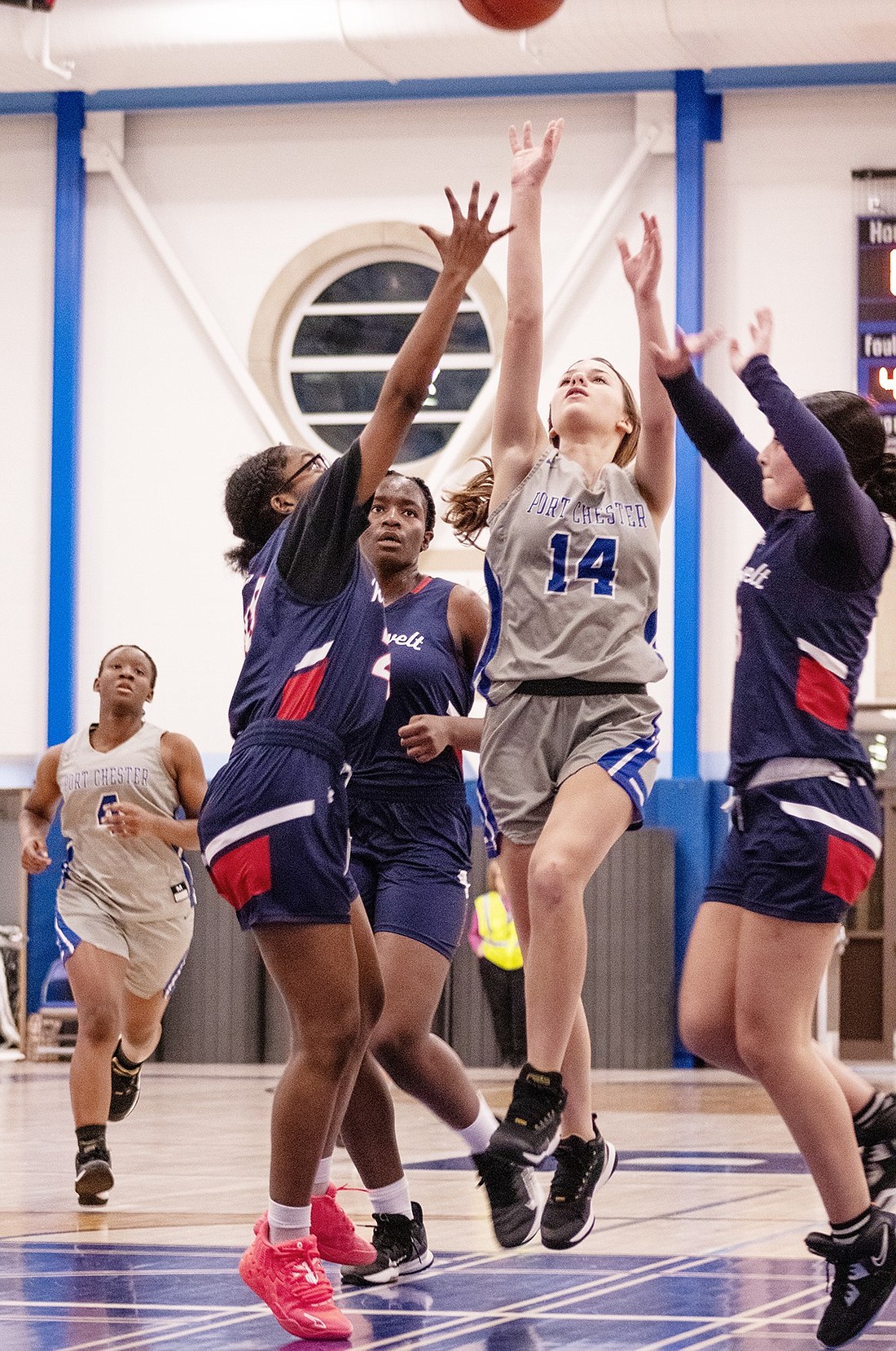 Freshman Alyssa Gagnon jumps up to shoot the ball while being defended by Roosevelt players during a home basketball game on Jan. 22. She is among the bumper crop of underclassmen who will make up next year’s Lady Rams basketball team.