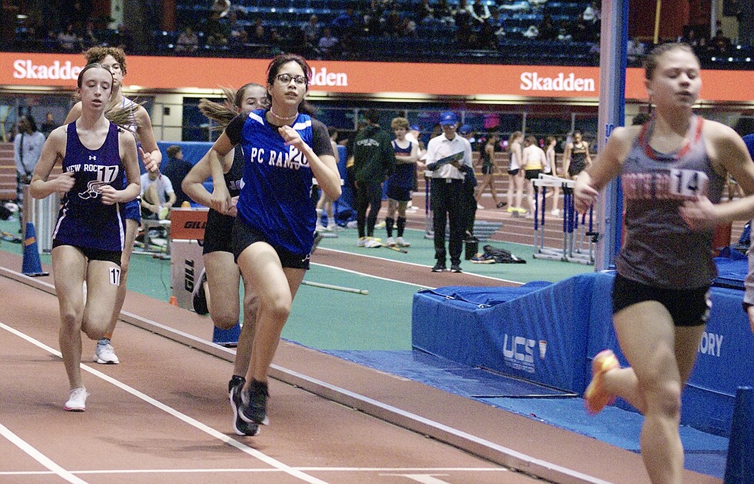 Port Chester Lady Ram Mayerin Torres (#20) competes in the 1,000-meter run at the Class AA Championships at The Armory in New York City on Feb. 12.