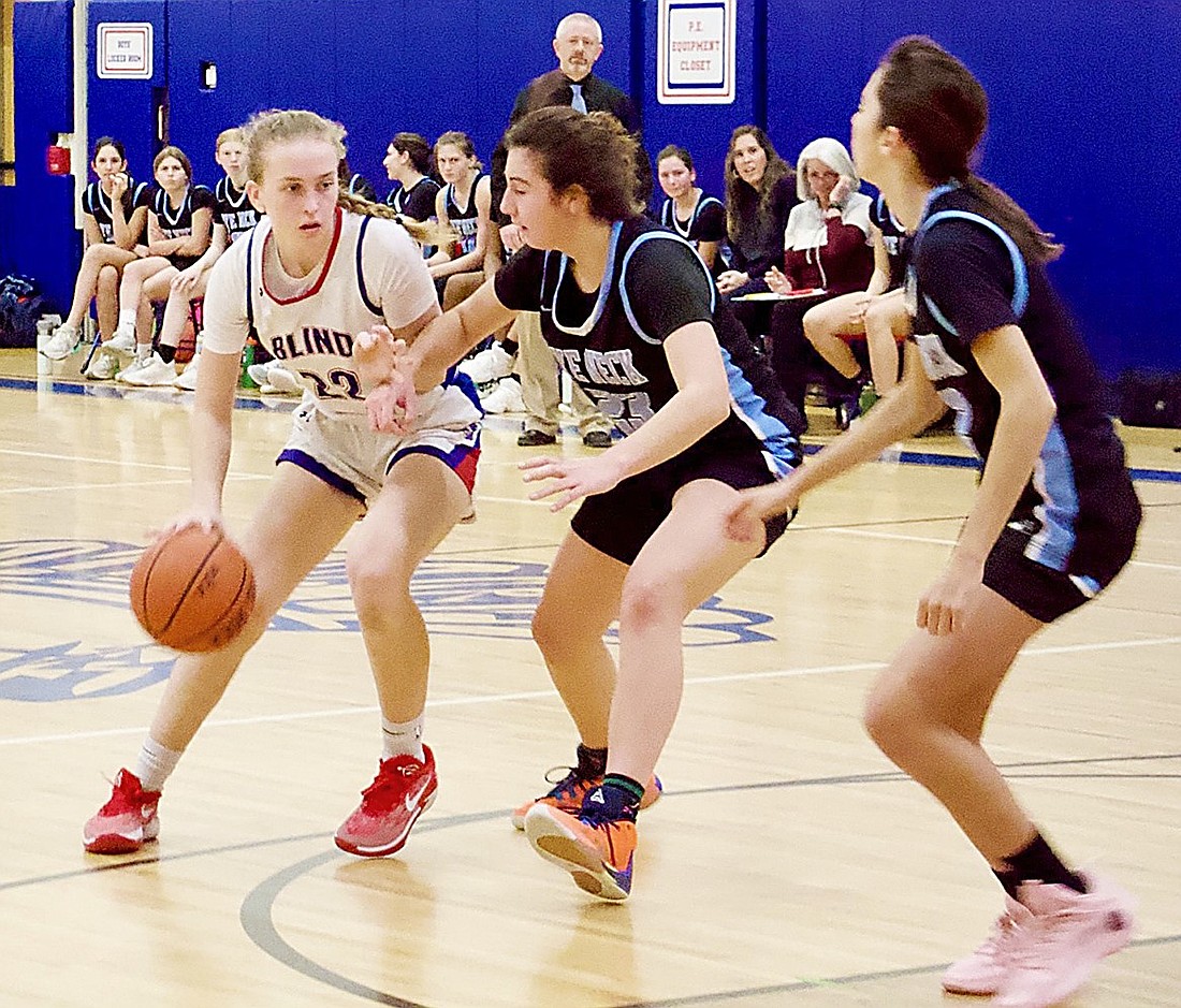 Sophomore star Kendall Konigsberg led the Trojans in scoring with 21 points in their Feb. 20 quarterfinal playoff game against Westlake, as she did in this Feb. 5 contest with Rye Neck and has done all year.