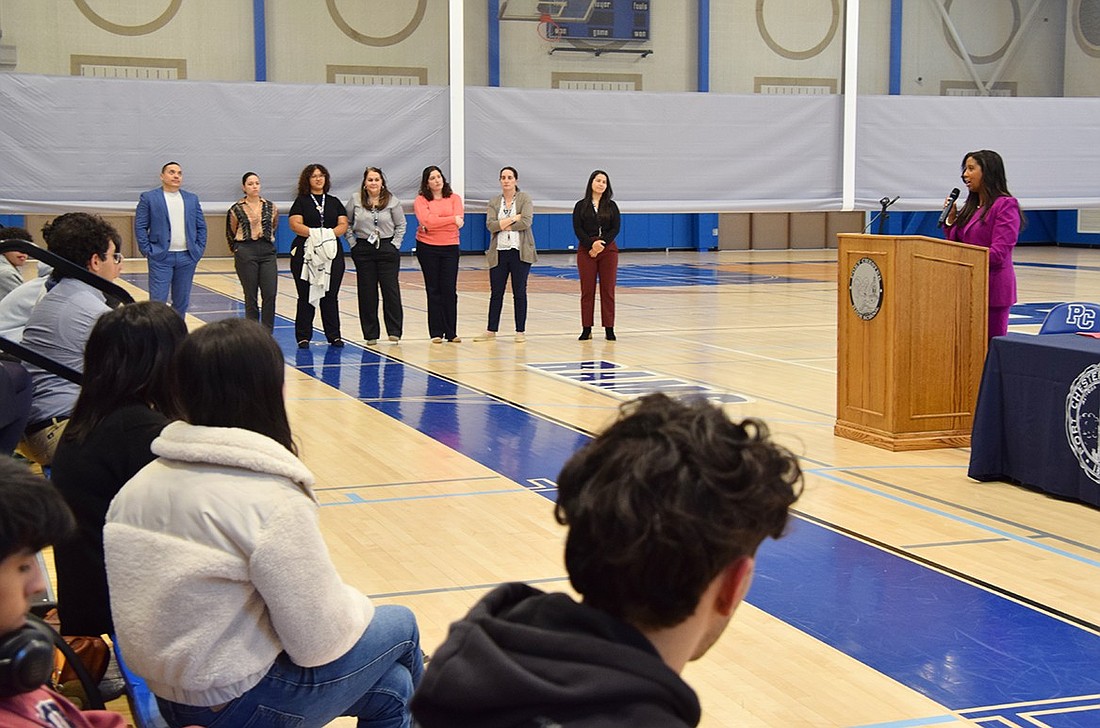 Port Chester Superintendent Dr. Aurelia Henriquez speaks to district high schoolers about the transformative opportunities that college provides on Monday, Feb. 26. She’s speaking at a presentation announcing a new partnership with Purchase College that will give two students grants to cover on-campus housing costs.