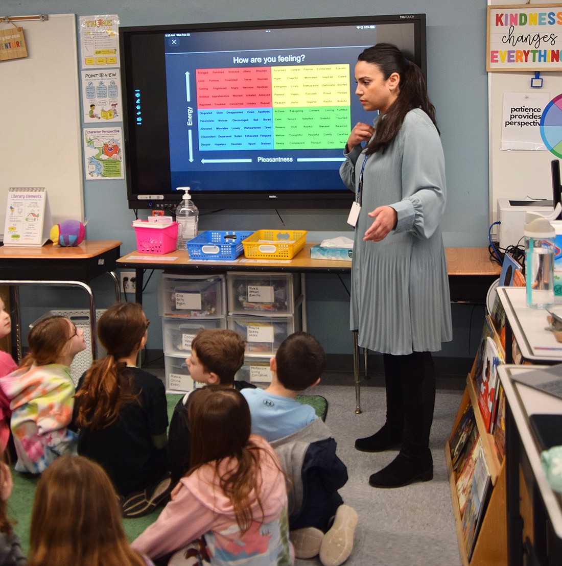 School Counselor Katarina Pumarejo asks Ridge Street Elementary School third-graders in Amy Blumstein’s class to identify how they’re feeling using a mood meter, one of the tools used with the newly initiated Yale RULER program, during her 40-minute block spent with the children on Wednesday, Feb. 28.