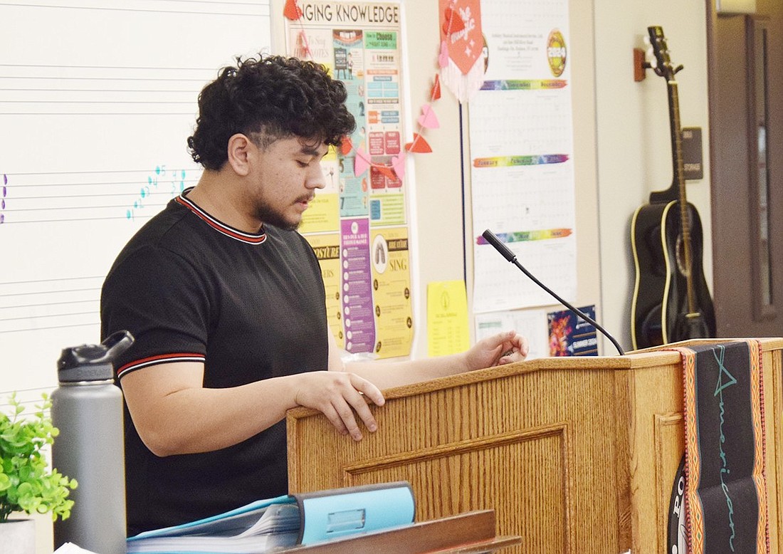 Port Chester High School senior Kevin Lorenzana reads his poem “The Reflection,” at the 19th annual Phillis Wheatley Poetry Slam on Thursday, Feb. 29. The Haseco Avenue resident won the competition, following a performance he spent three months crafting.