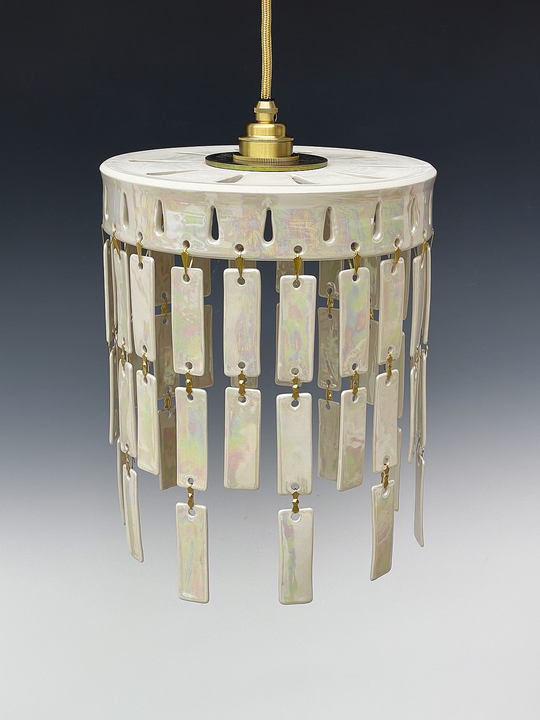 Chandelier by Palmer is one of the artworks in the Clay Art Center exhibition Lighting the Way, on view Sat., Mar. 9-Apr. 5. See Exhibits below for details.