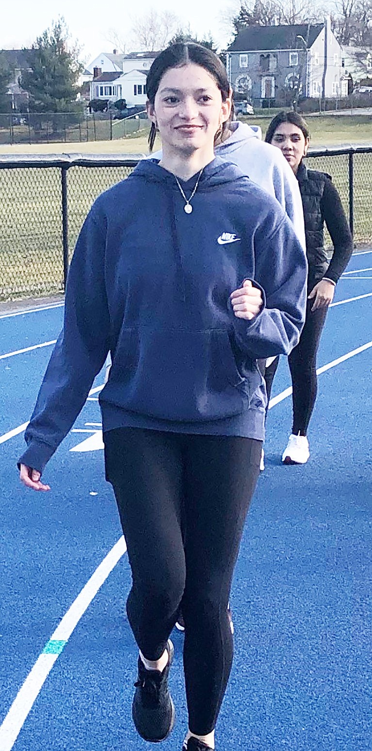 Senior Alexandra Cruz runs on the Port Chester High School track. She is one of the Lady Rams’ best and most versatile runners. She has been the team’s long-distance running captain since her sophomore year.