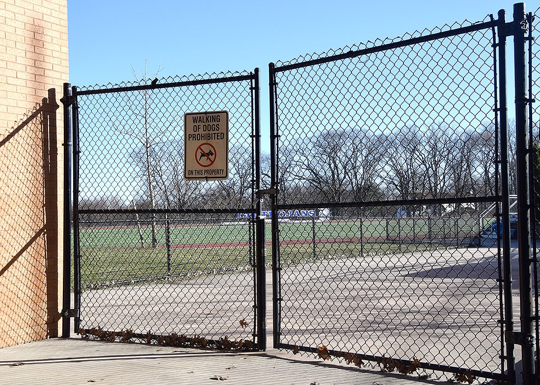 The gates leading to the Blind Brook High School multipurpose athletic field sit locked after the announcement that it, along with the baseball field, is no longer rated safe to play on. With neither field deemed suitable for use, the district must come up with a plan to replace them.