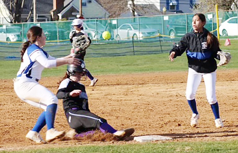 Port Chester’s Heidi Gonzalez at third base throws to Karah Provenzano at shortstop in time to get the Blind Brook runner out before she tags the base in last Saturday’s (4/6) high-scoring game between the two Rye Town teams.