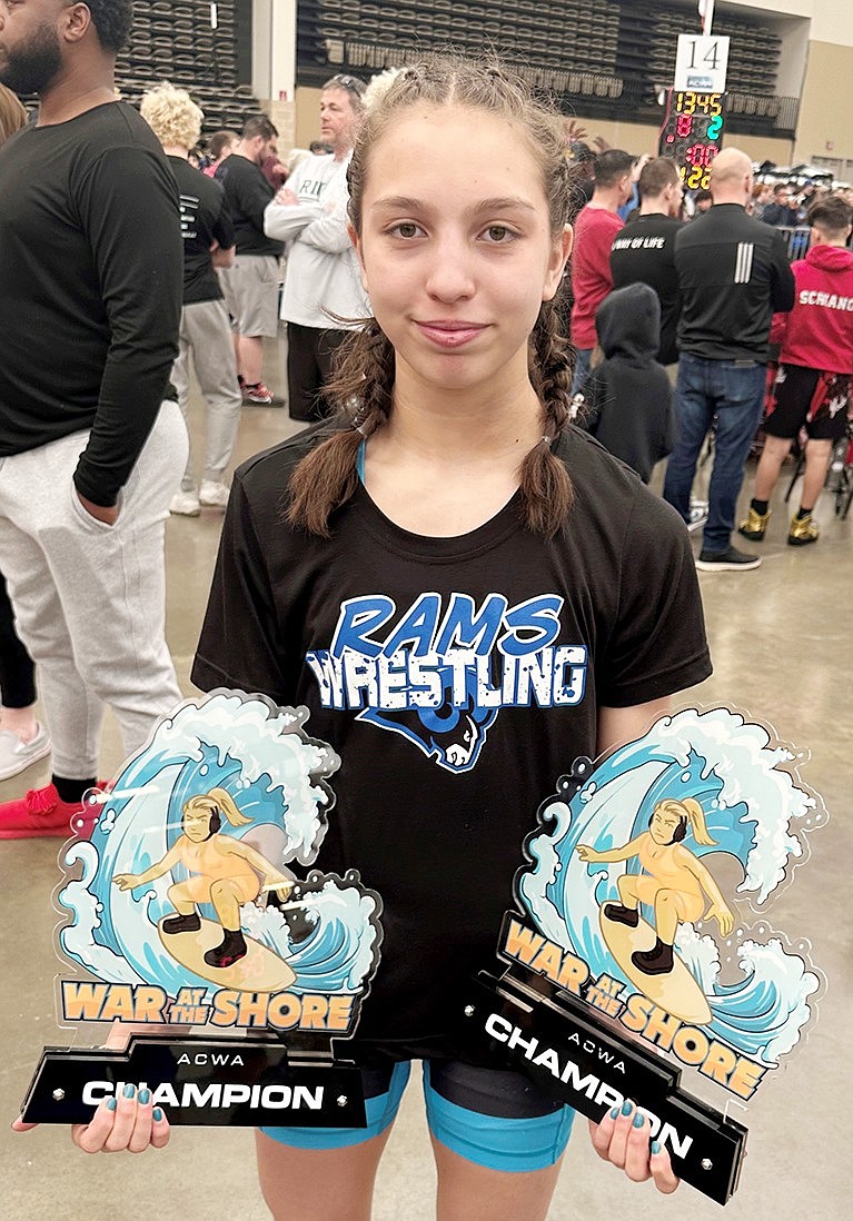 Port Chester Middle School 8th-grader Laila Builes won both the girls’ high school and middle school lightweight divisions at the War on the Shore wrestling tournament in Wildwood, N.J., Mar. 29-30.